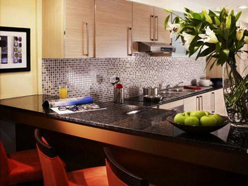 Somerset West Bay Doha Habitación foto A kitchen at The Standard East Village